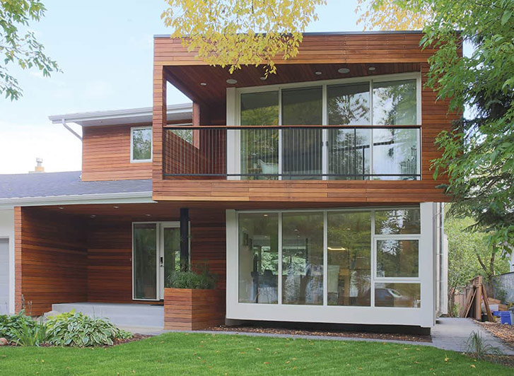 Though the extensively renovated Kildonan house sits across the street from the Red River, it still has the feel of a riverside home, thanks to a cantilevered living space that creates gorgeous views of the water.