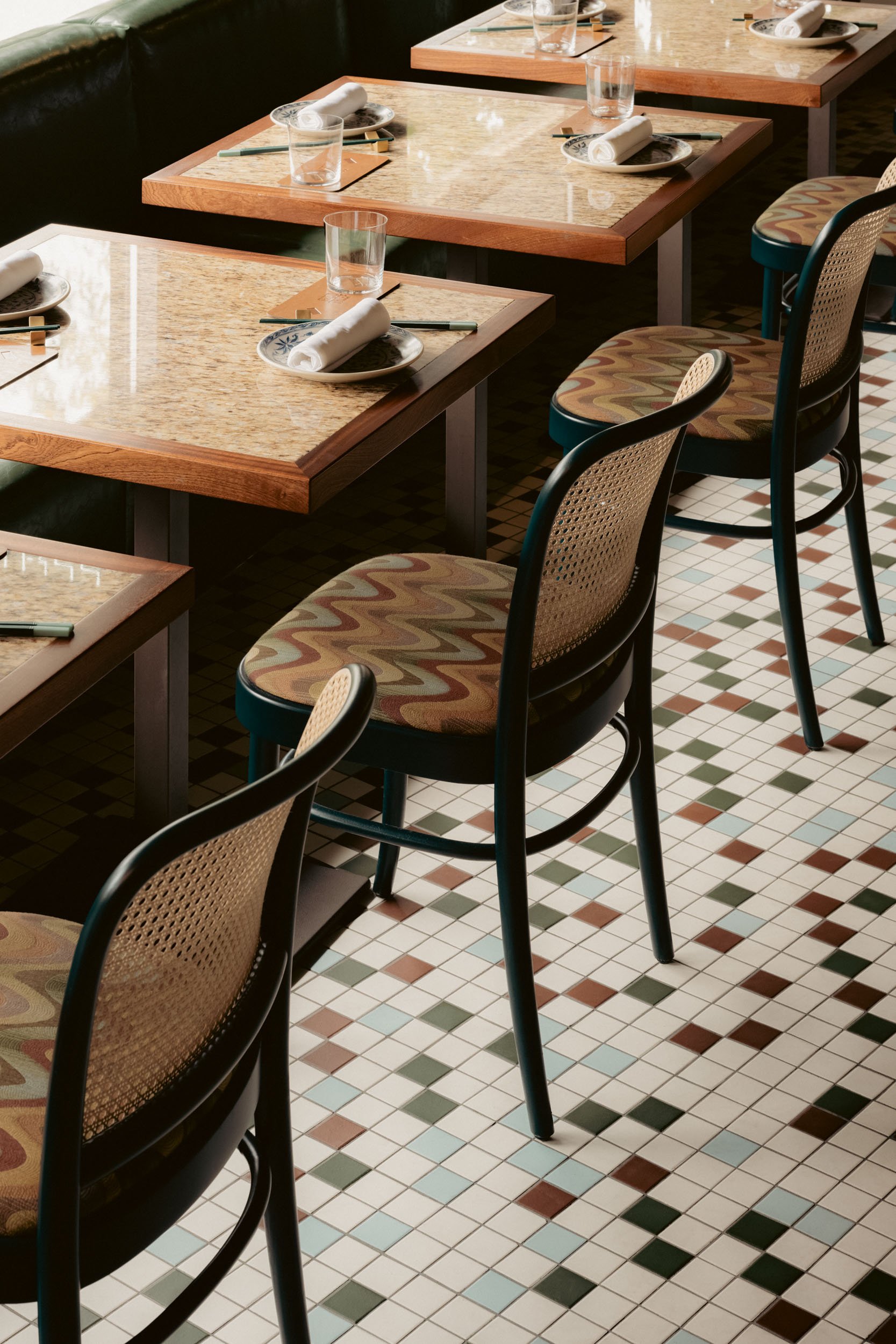 Faux-leather booths and textured interior details at Good Thief, Vancouver