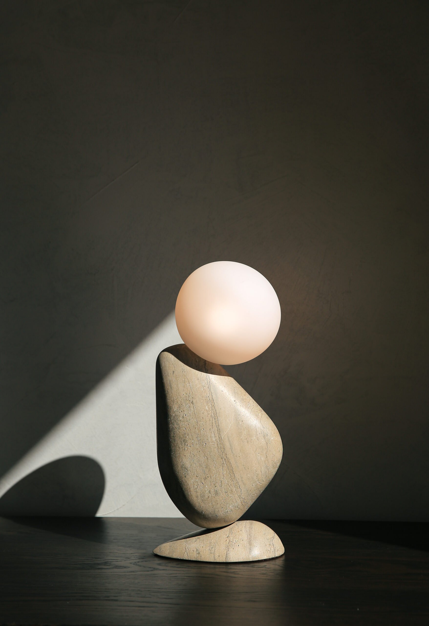 Ben lamp in Roman travertine by Matthew McCormick Studio