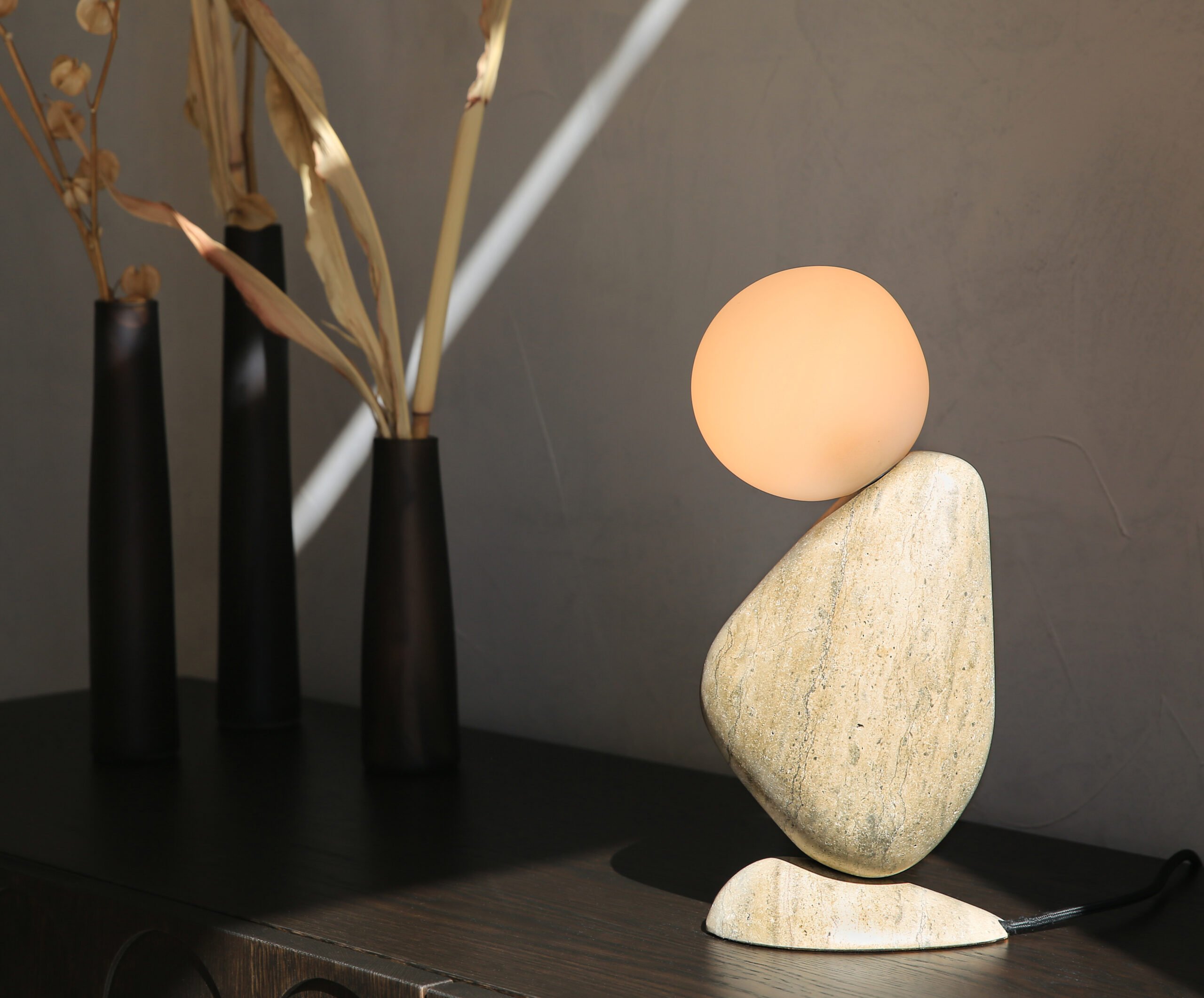 Interchangeable stone forms in the Ben lamp by Matthew McCormick Studio