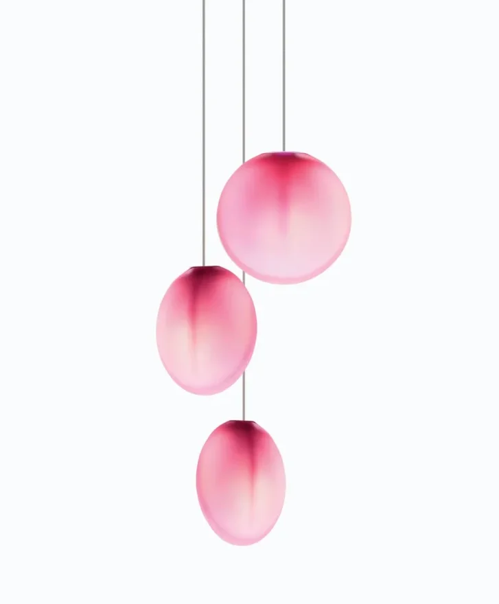 Matthew McCormick Ova lights in fuchsia hanging as glowing discs