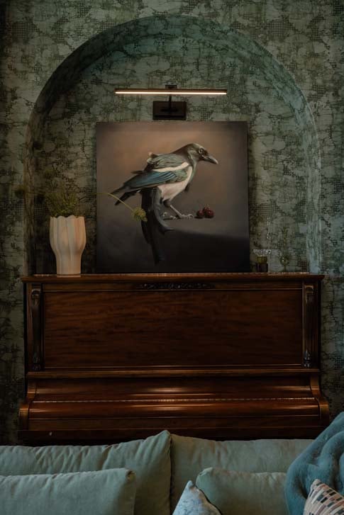 Monochromatic green lounge at East Elbow Residence, Calgary