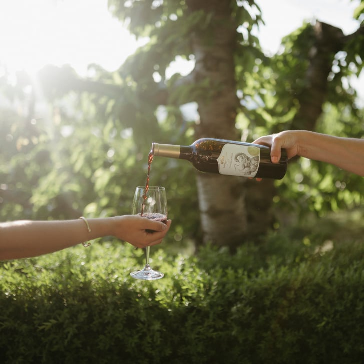 Fruit wine being poured at Elephant Island Winery in Naramata