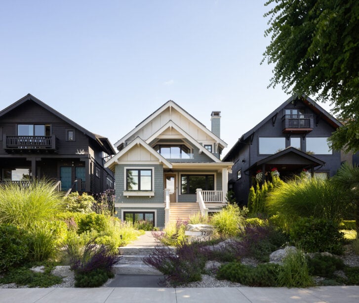 Gravel garden with native plants and custom-cut feature boulder for address sign by Donohoe Living Landscapes