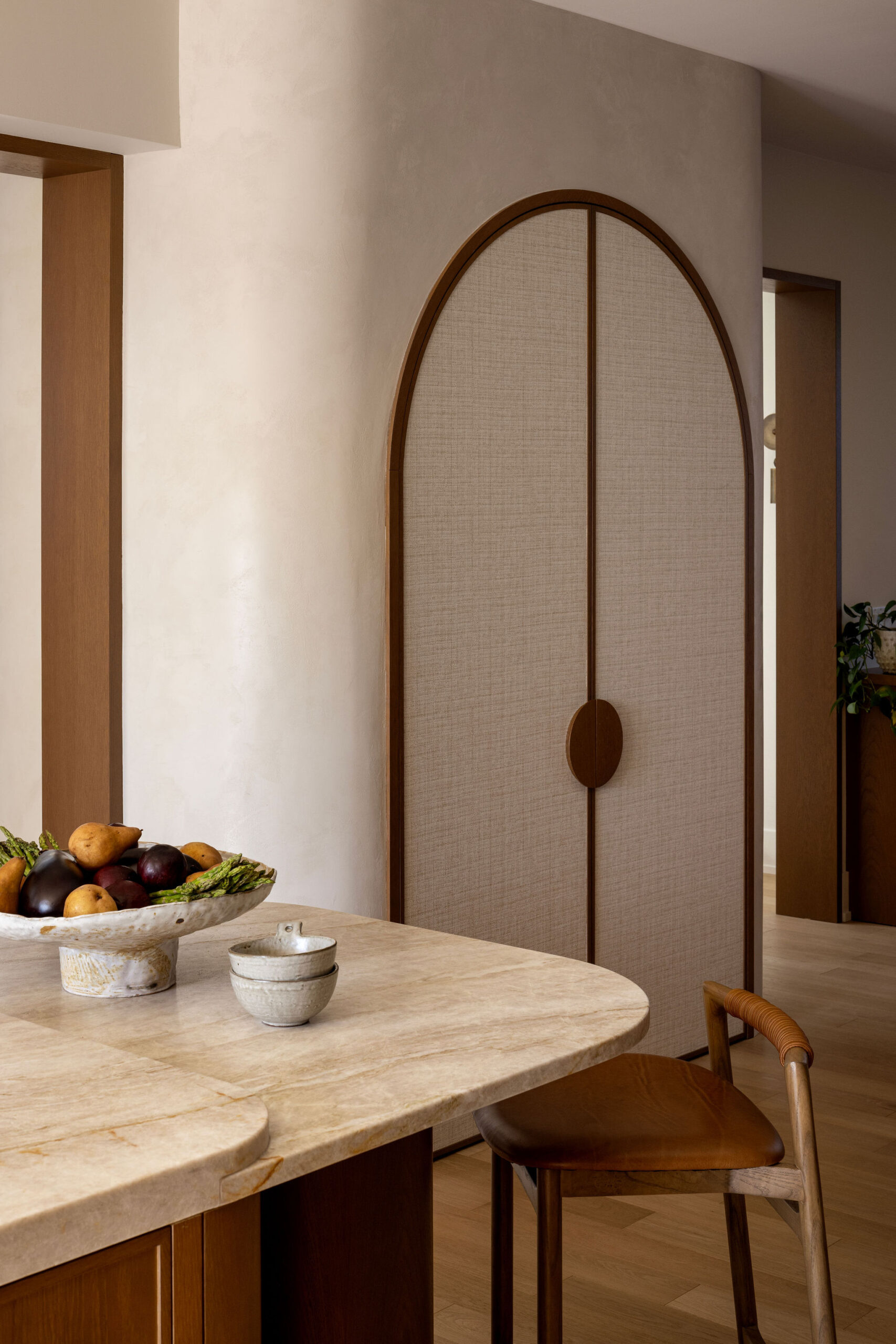 kitchen pantry with arched doors