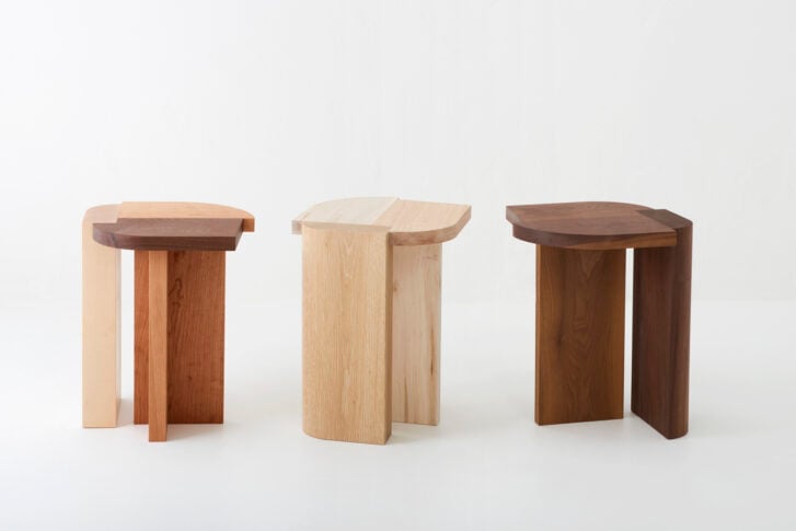 Kate Duncan Cooper stool in mixed wood, shown in three finishes