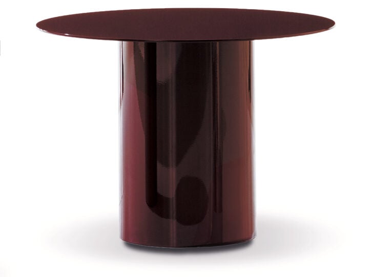 Minotti Tokie sculptural round coffee table in a deep plum finish
