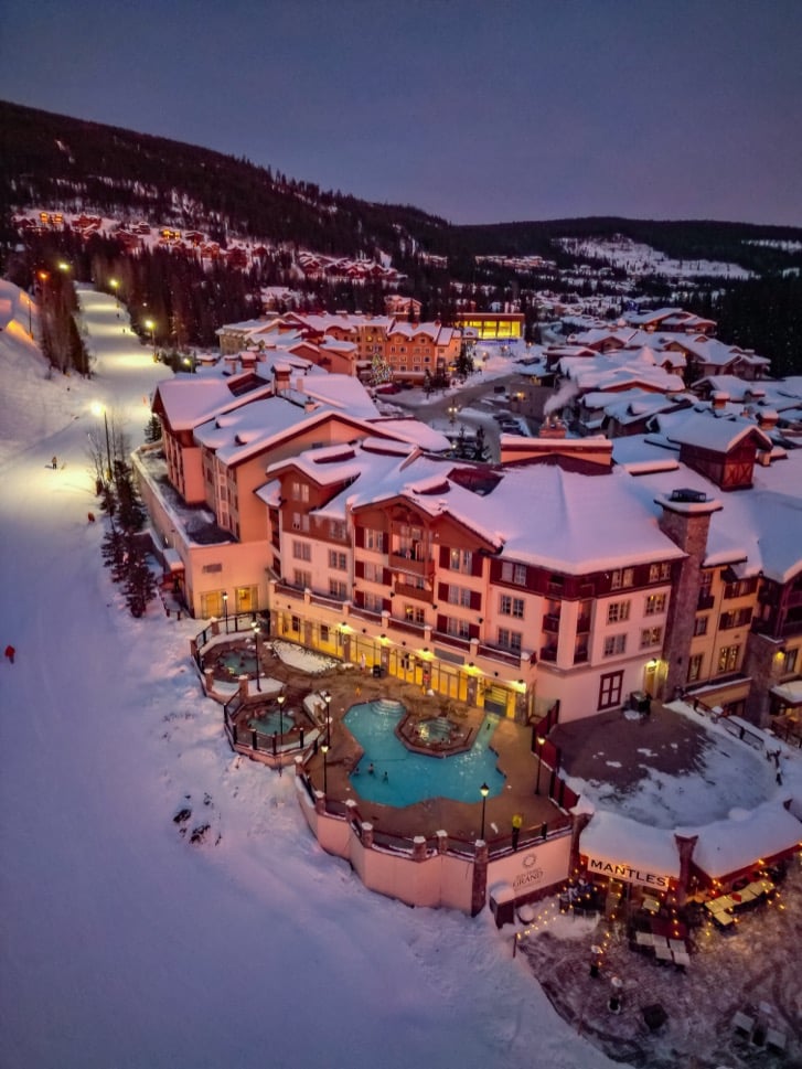 Sun Peaks Grand Hotel and the surrounding alpine village at sunset