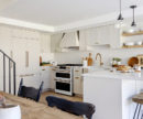 a kitchen in a whistler cabin with fresh white cabinets