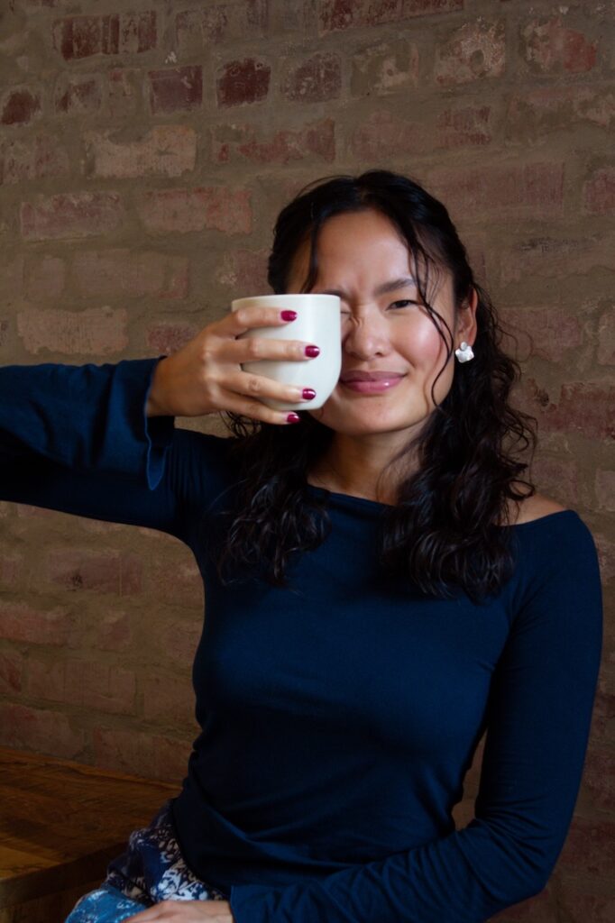 Selena Barcenas holding the rhythm cup designed for Nemesis 